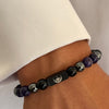 Rengetsu Yūgan Silent Depth luxury Charoite men’s bracelet worn by male model – lifestyle photoshoot